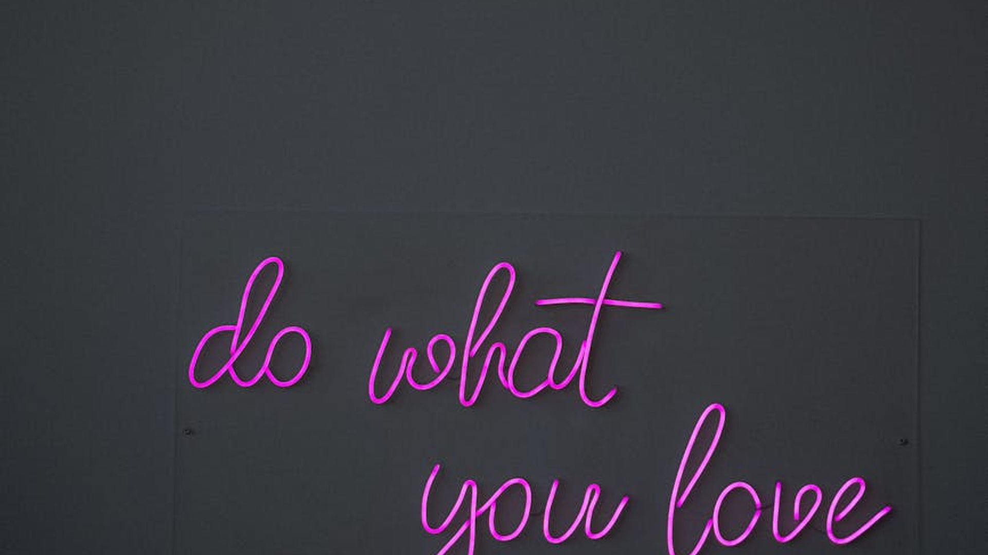 Dark modern gym interior with purple neon lighting