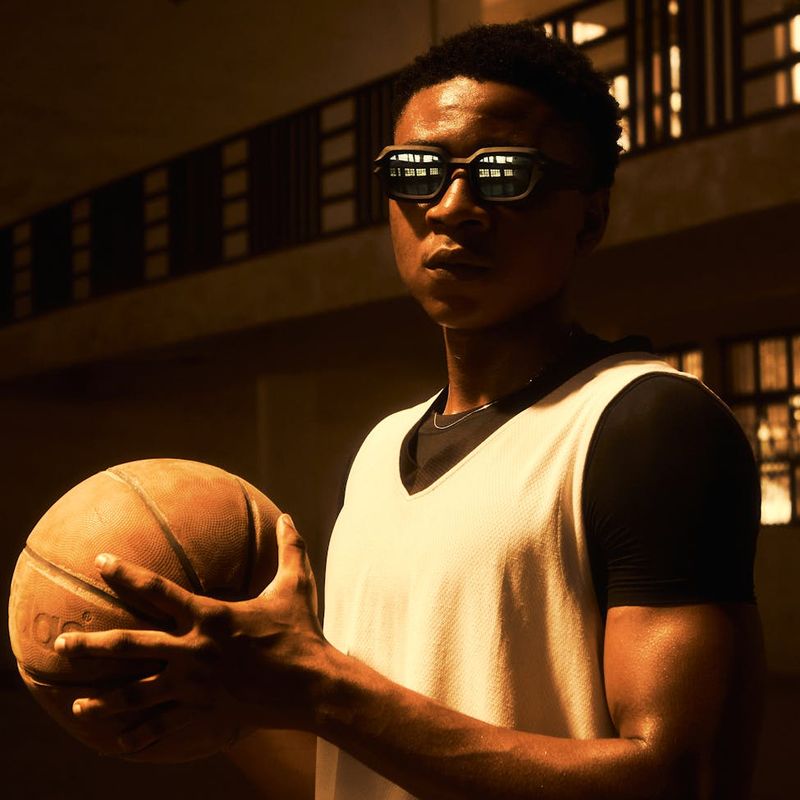 Intense focus of an athlete in a dark training hall